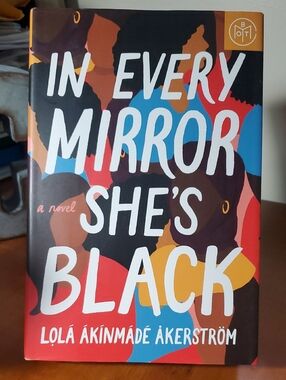 "In Every Mirror She's Black" by Lola Akinmade Akerstrom - Bold Multicolor Cover